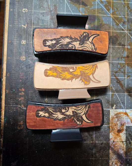 Handcrafted Highland Cow Hair Clip by Diamond K Leathers. Unique leather design in light brown, dark brown, or white.